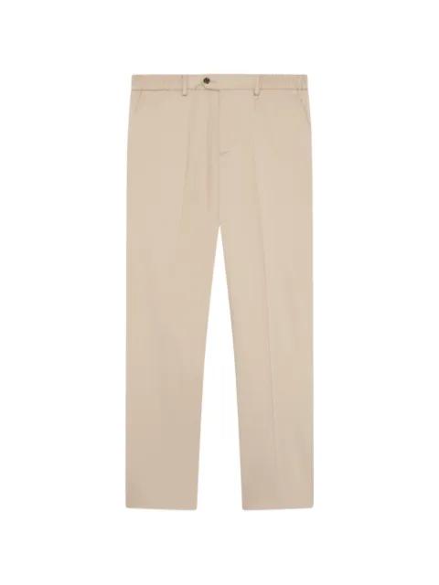 flat-front elasticated-sides trousers by LARDINI