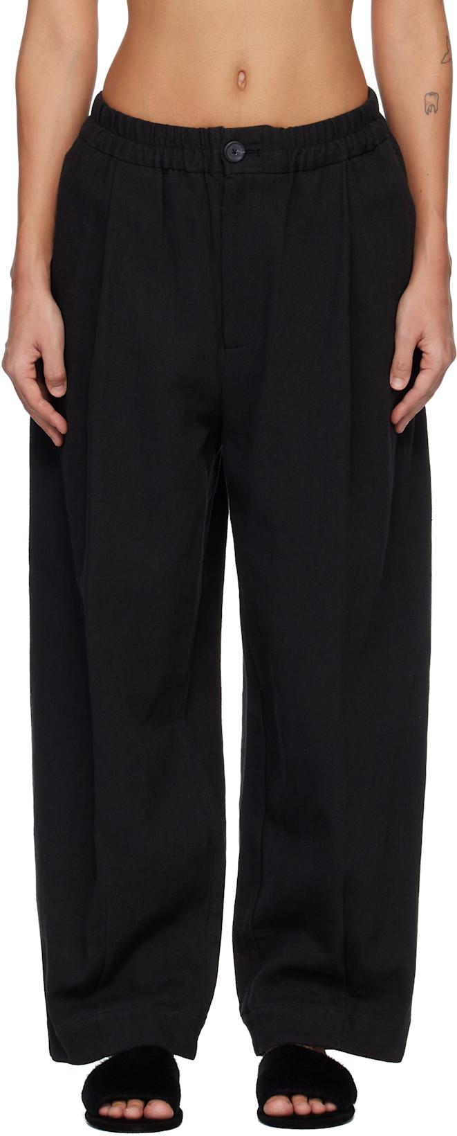 Black Matte Trousers by LAUREN MANOOGIAN