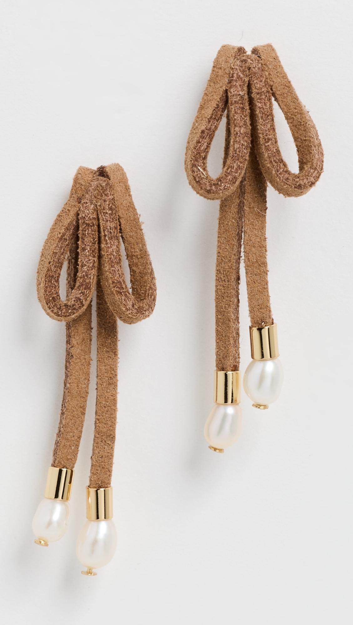 Faux Suede Bow Earrings by LELE SADOUGHI