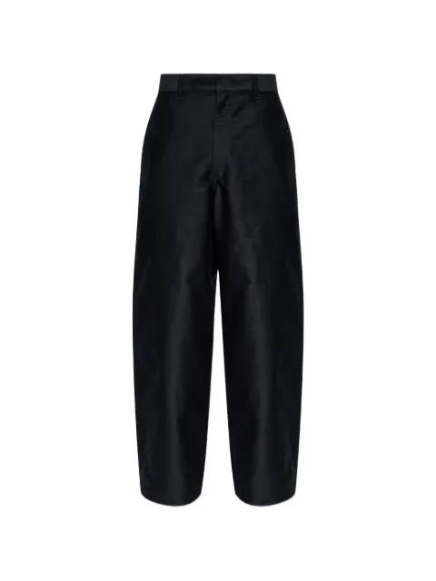 button pocket trousers by LEMAIRE
