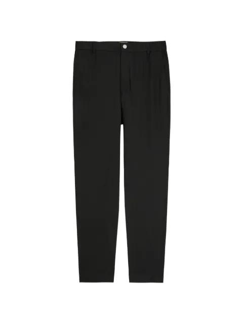 pleat-detail trousers by LESTRANGE