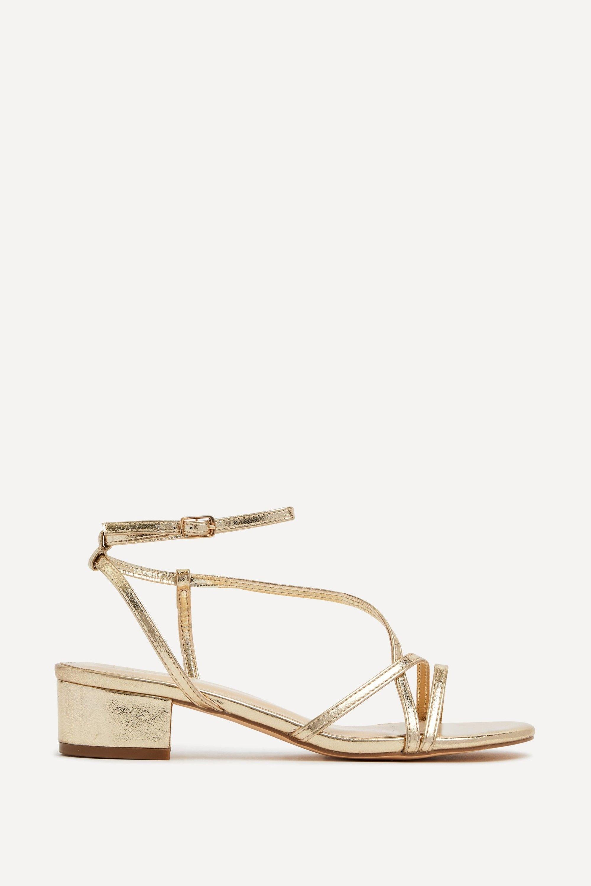 Calista Gold Faux Leather Strappy Low Block Sandal by LINZI Calista Gold Faux Leather Strappy Low Block Sandal by LINZI