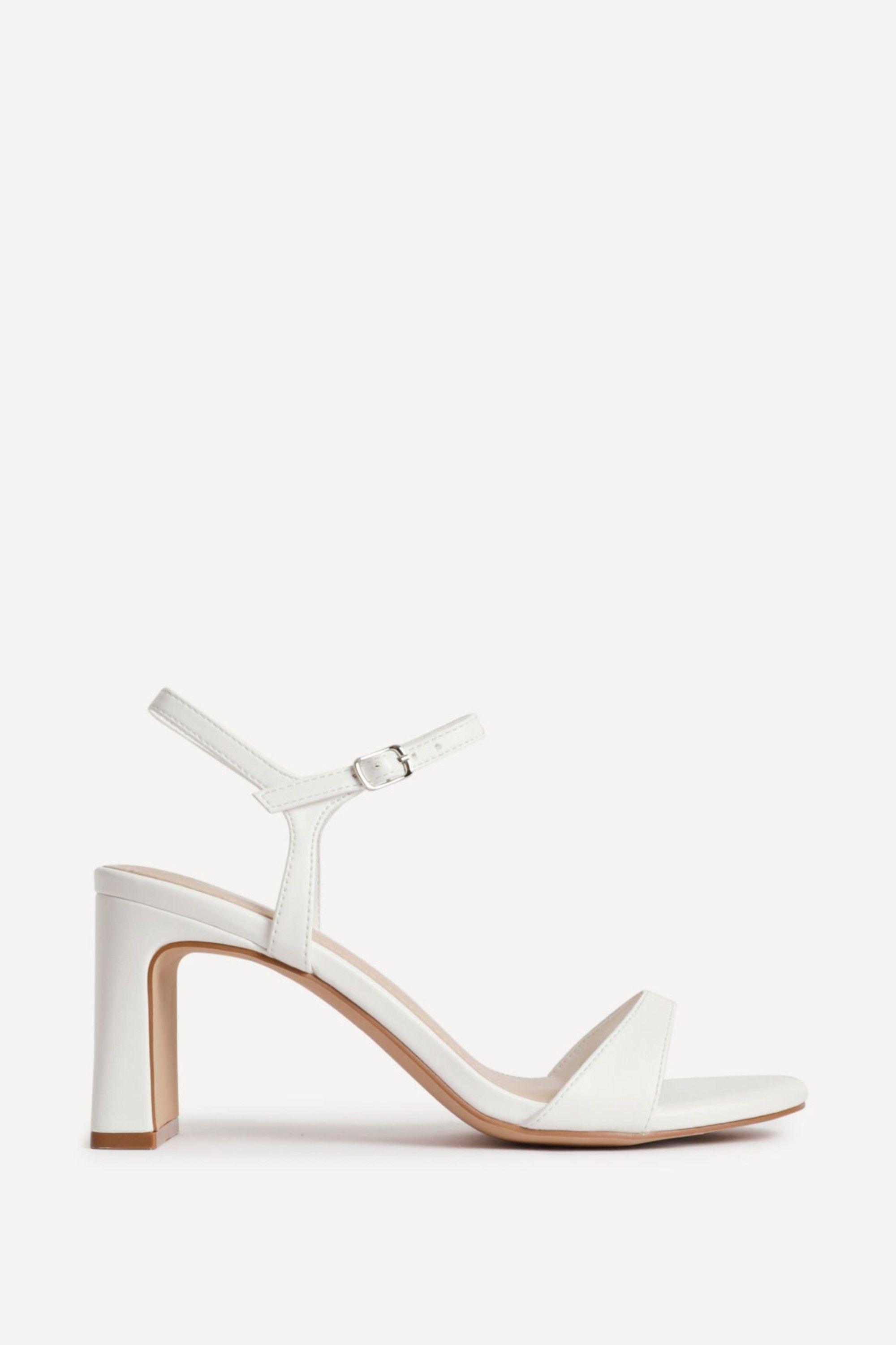 Charisma White Faux Leather Heeled Sandals by LINZI