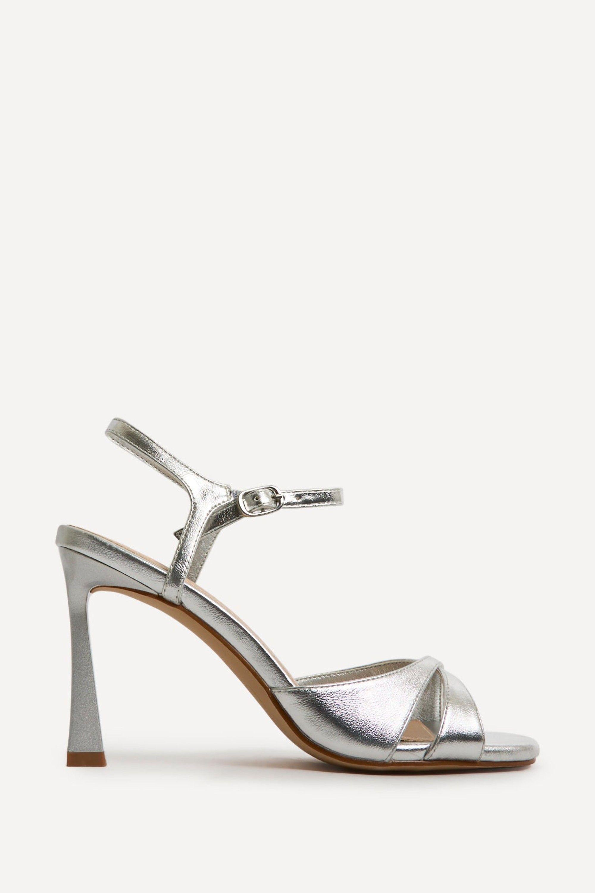 Compelled Silver Stiletto Heeled Sandals by LINZI