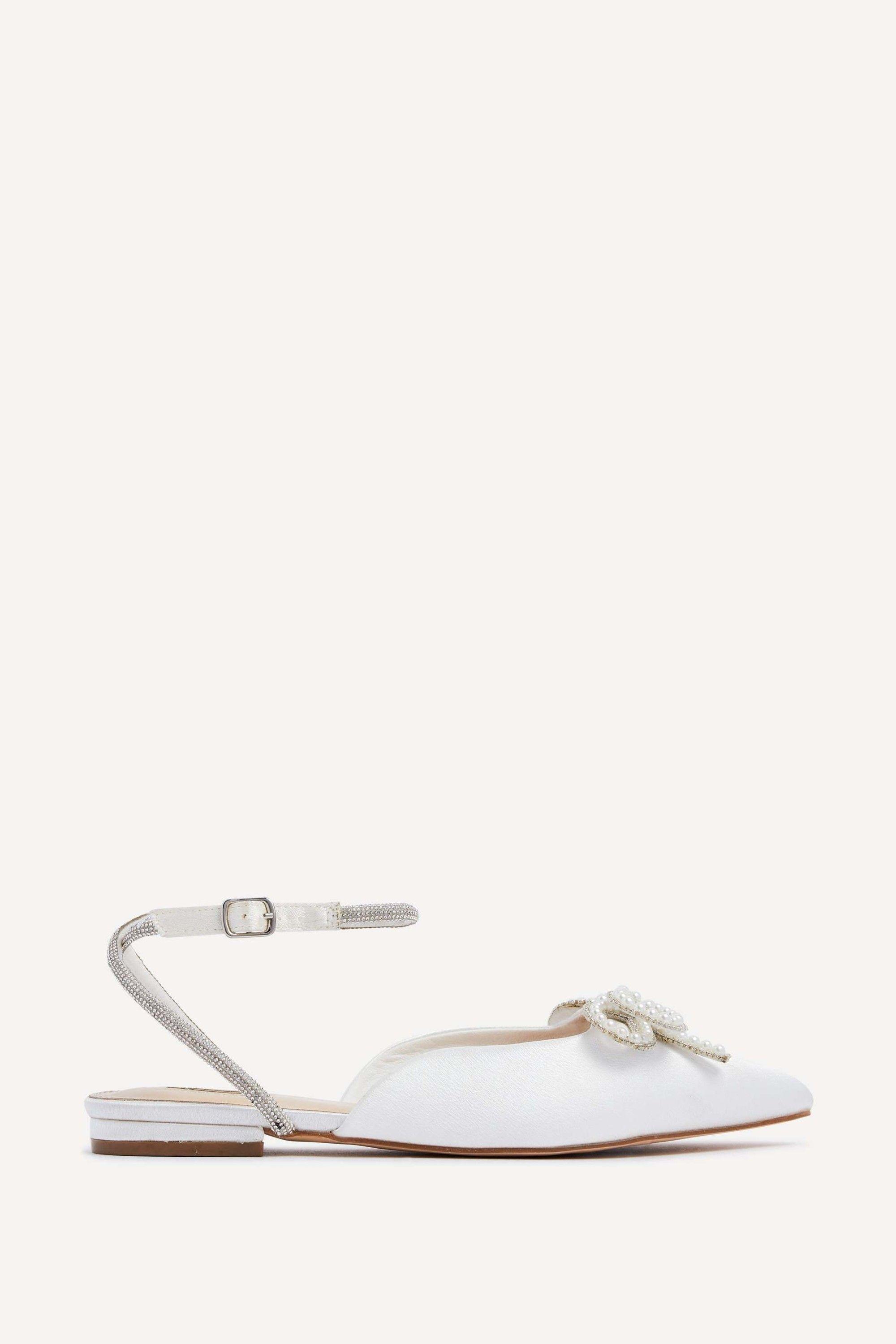 Lalita Ivory Satin Bow Embellished Flat Mules by LINZI Lalita Ivory Satin Bow Embellished Flat Mules by LINZI