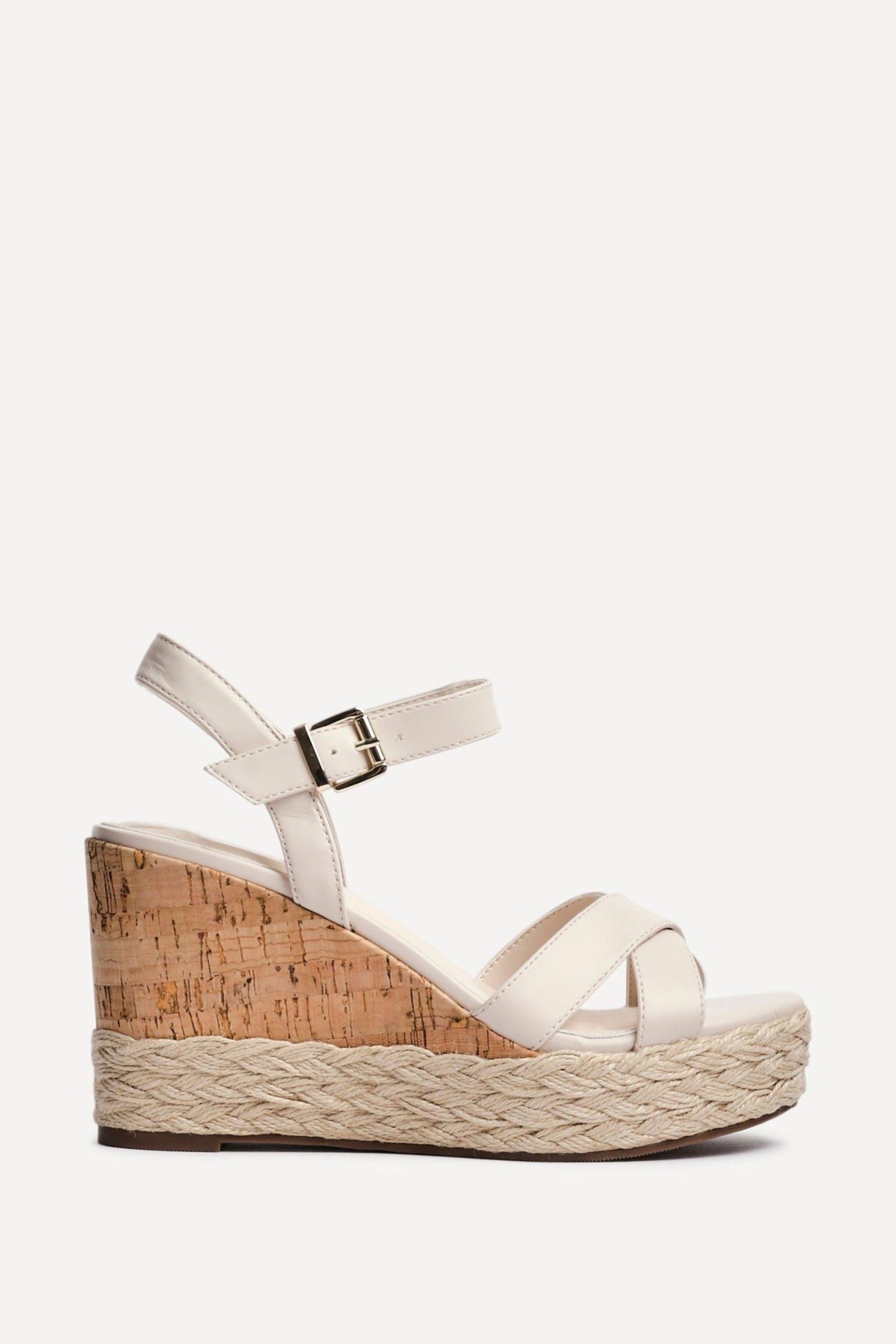 Lilia Nude Faux Leather Crossover Cork Wedge by LINZI