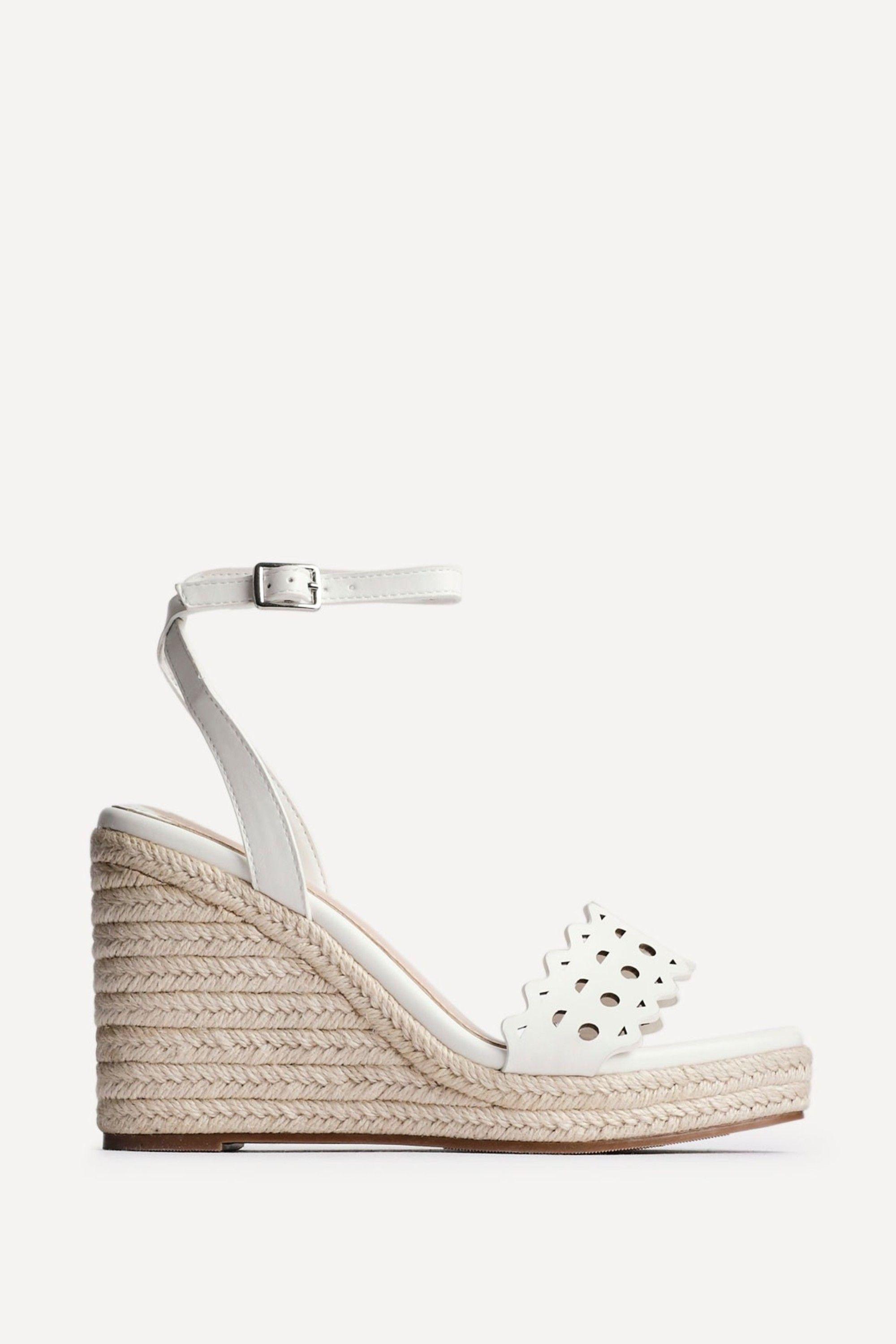Mellow White Faux Leather Wedge by LINZI