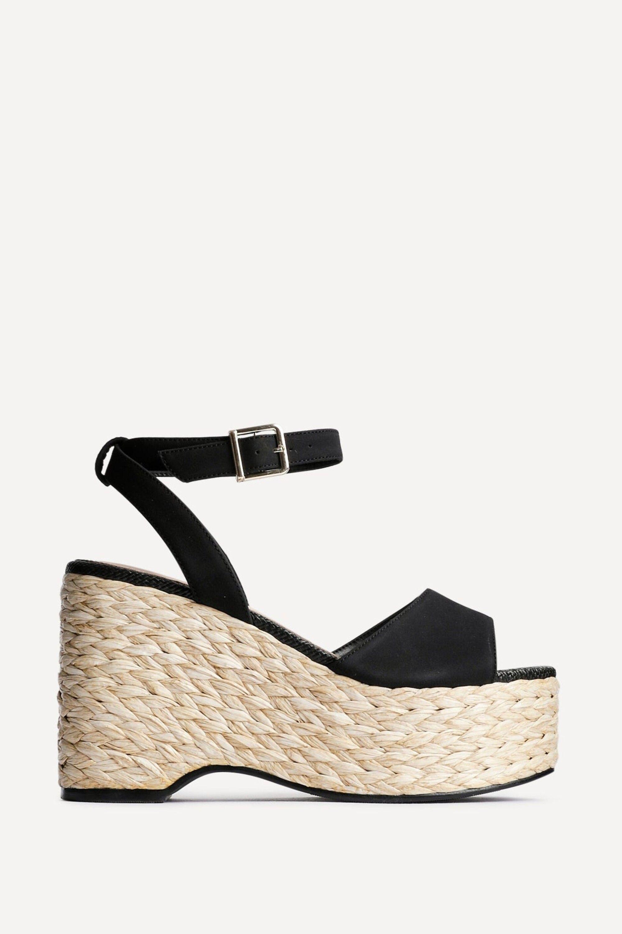 Pacific Black Faux Suede Platform Wedges by LINZI
