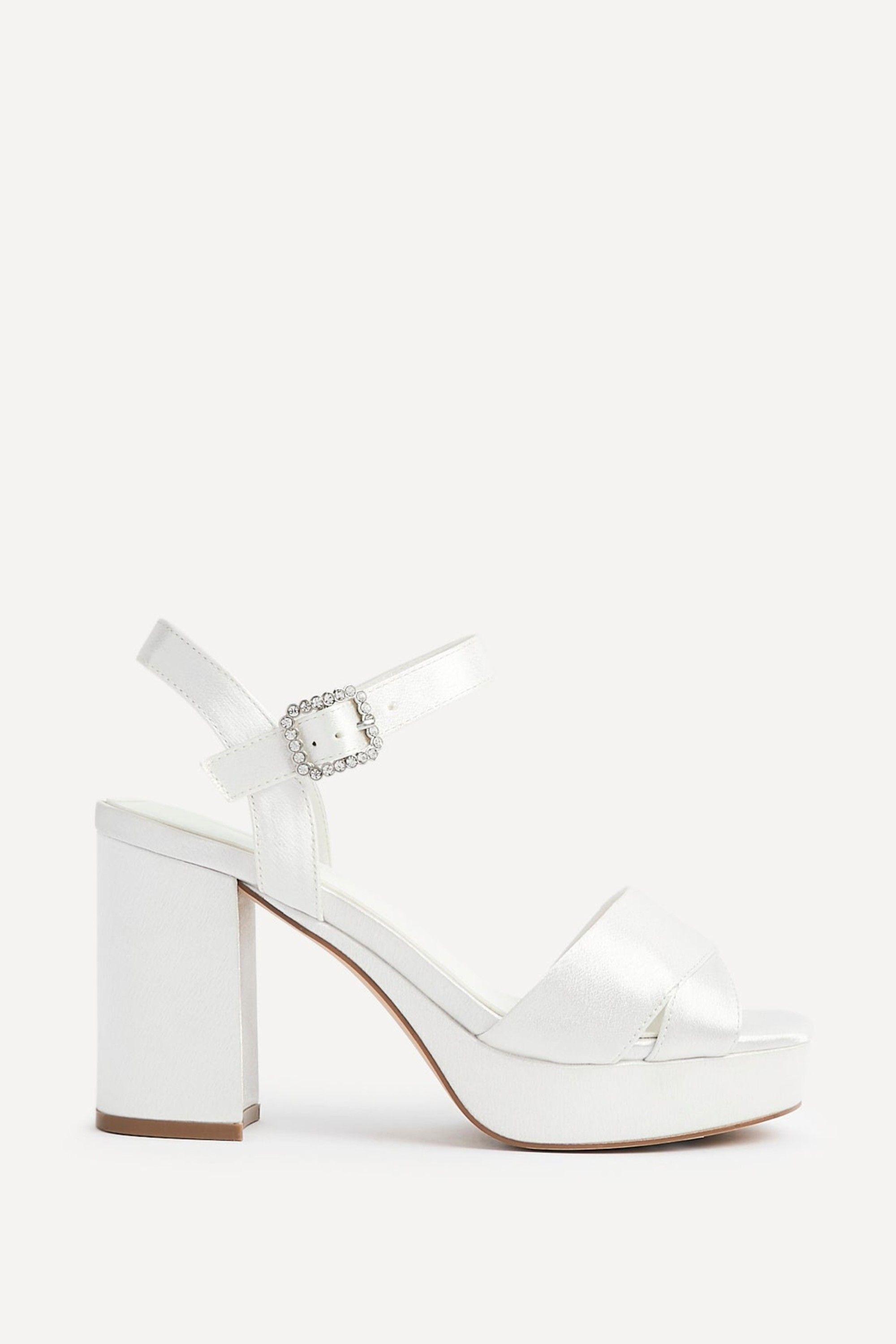Perola Ivory Satin Platform Heels by LINZI