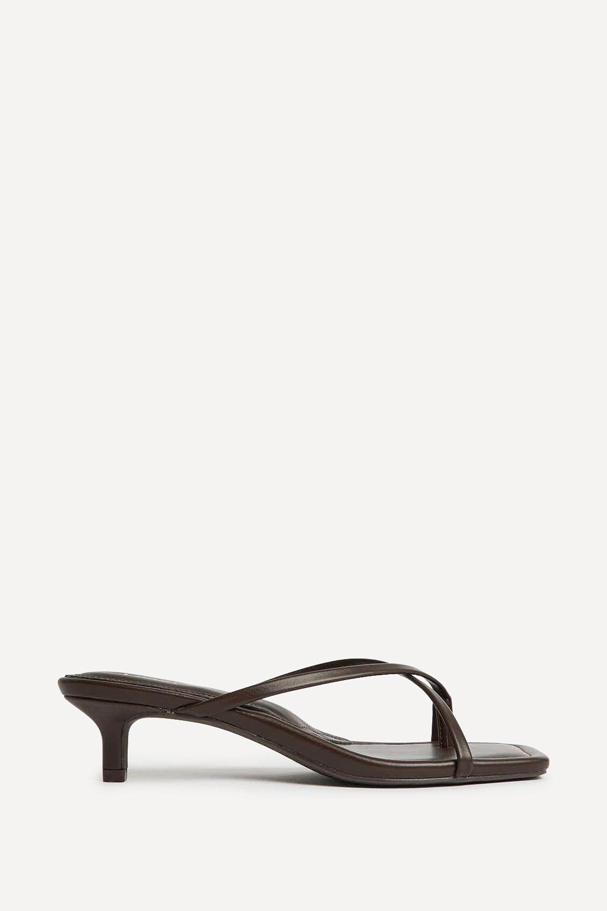Polished Brown Faux Leather Mule Heels by LINZI