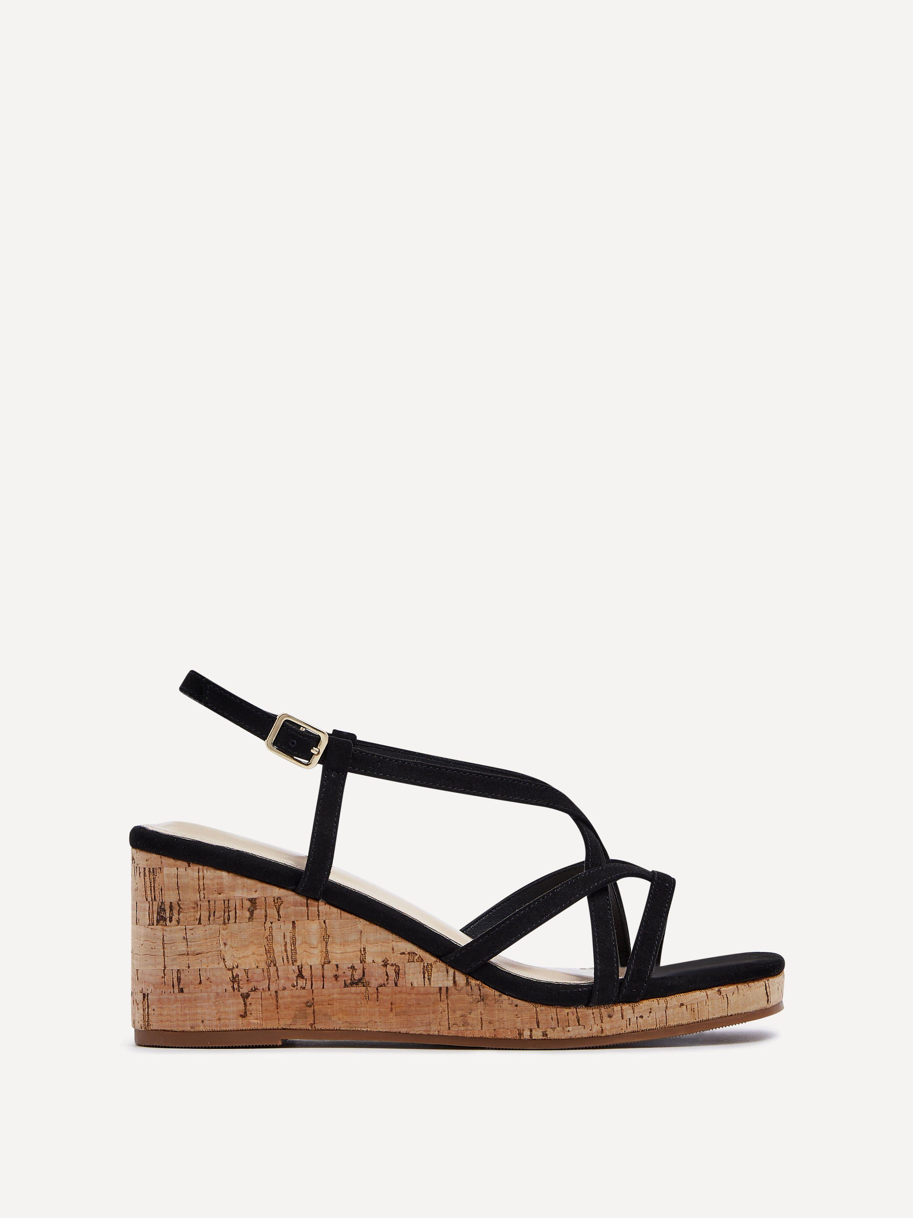 Safiya Black Faux Suede Strappy Wedge Sandal by LINZI Safiya Black Faux Suede Strappy Wedge Sandal by LINZI