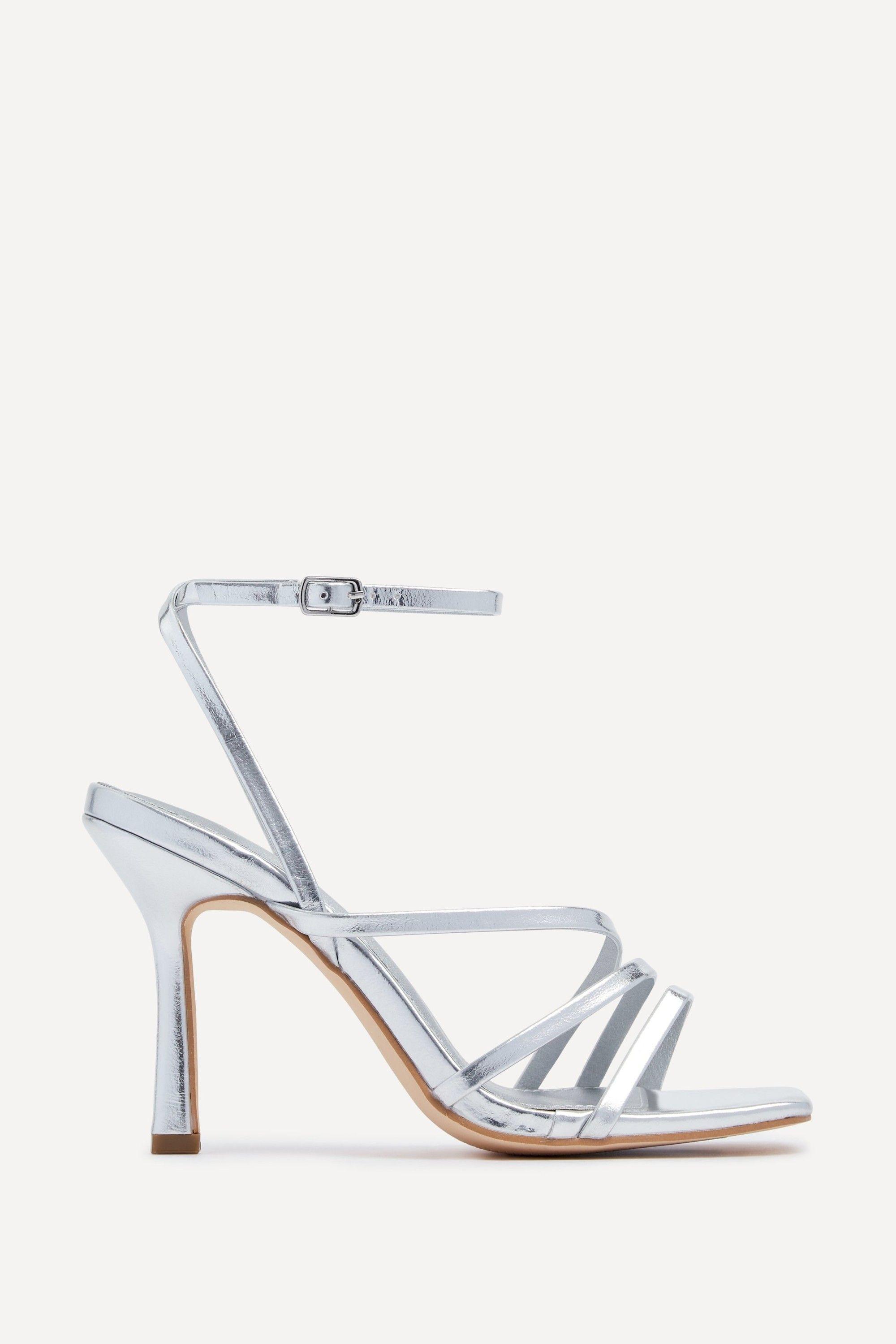 Scarlett Silver Faux Leather Strappy Heel Sandal by LINZI Scarlett Silver Faux Leather Strappy Heel Sandal by LINZI
