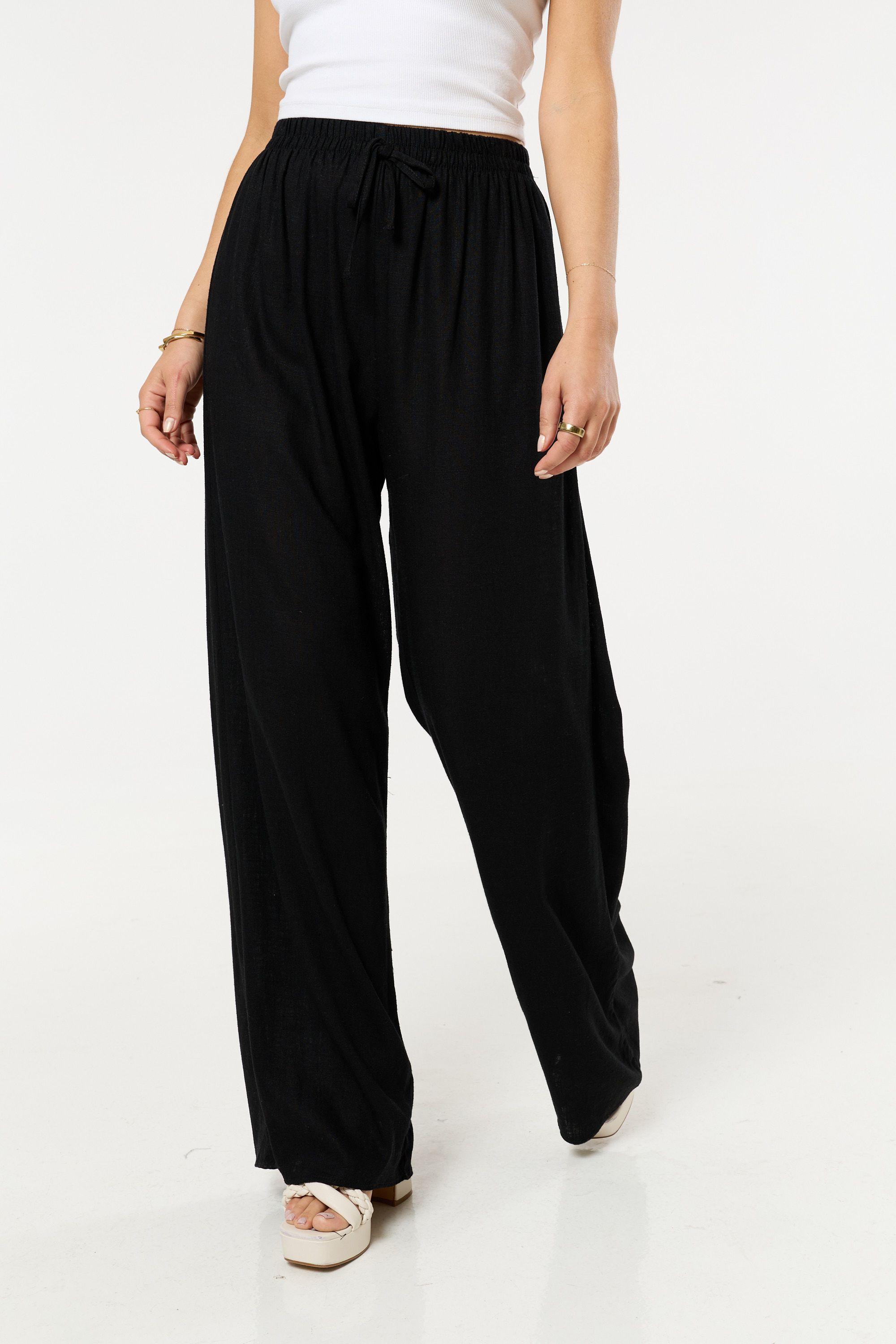 Black Linen Relaxed Fit Trousers by LIQUORISH