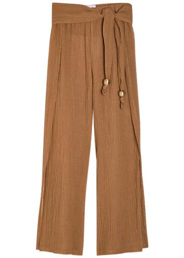Open side linen-blend beach trousers by LISA MARIE FERNANDEZ