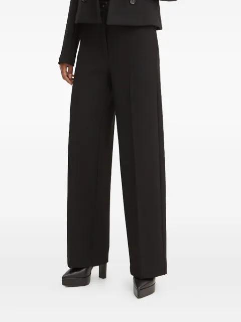 high-waisted trousers by LIVIANA CONTI