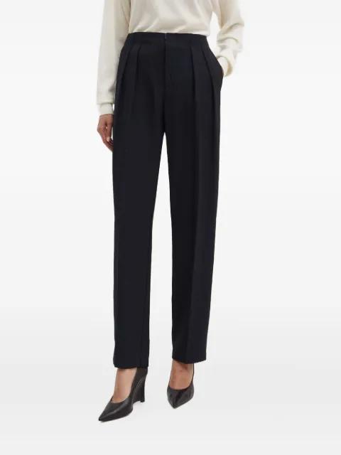 pleated trousers by LIVIANA CONTI