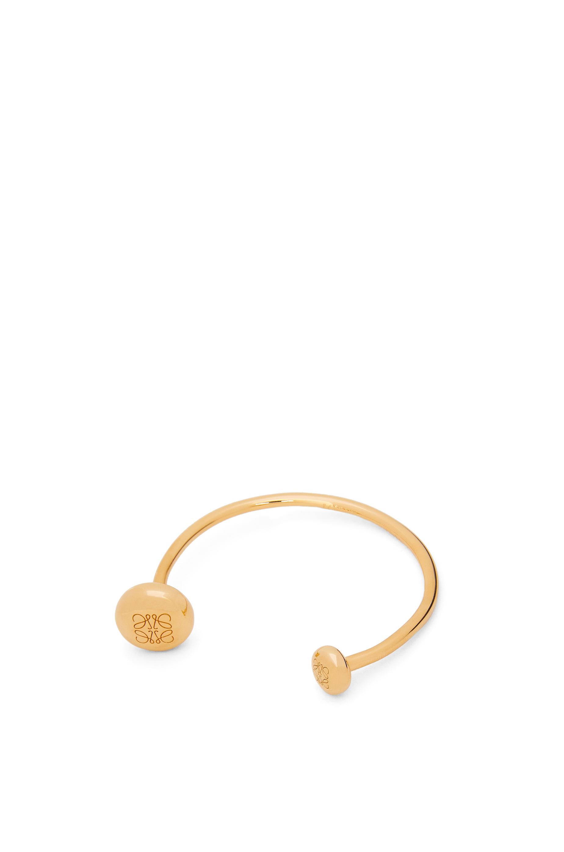 Anagram Pebble cuff in sterling silver by LOEWE