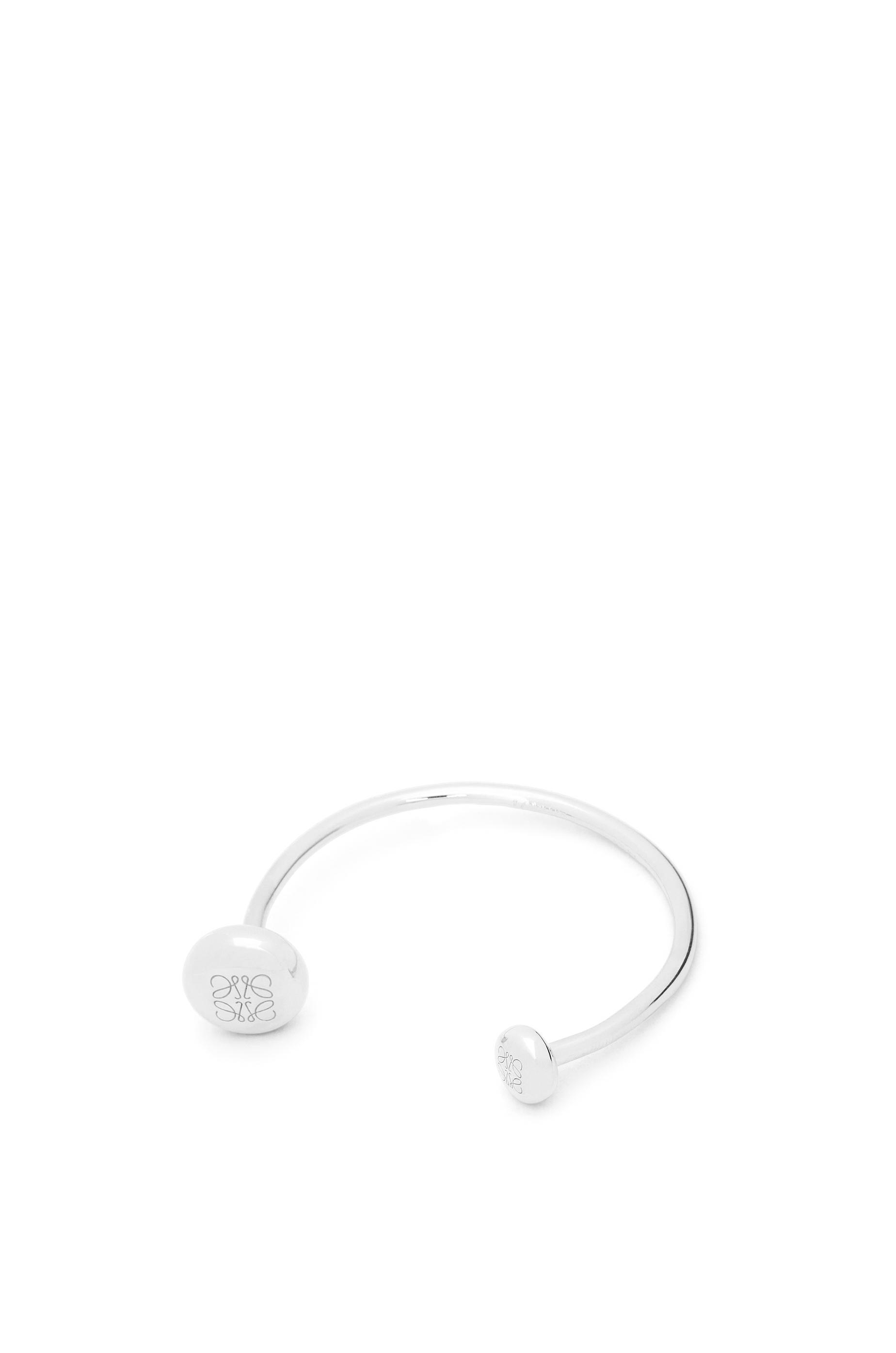 Anagram Pebble cuff in sterling silver by LOEWE