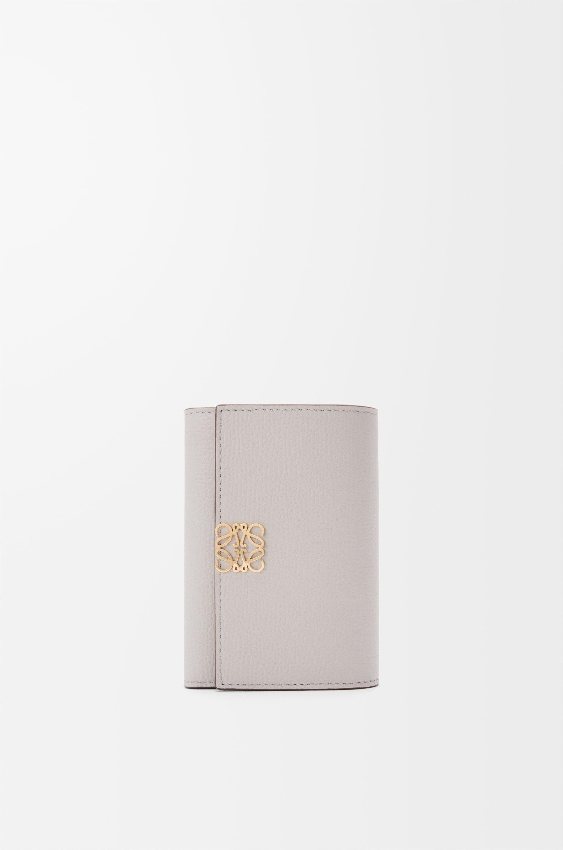 Anagram small vertical wallet in pebble grained calfskin by LOEWE
