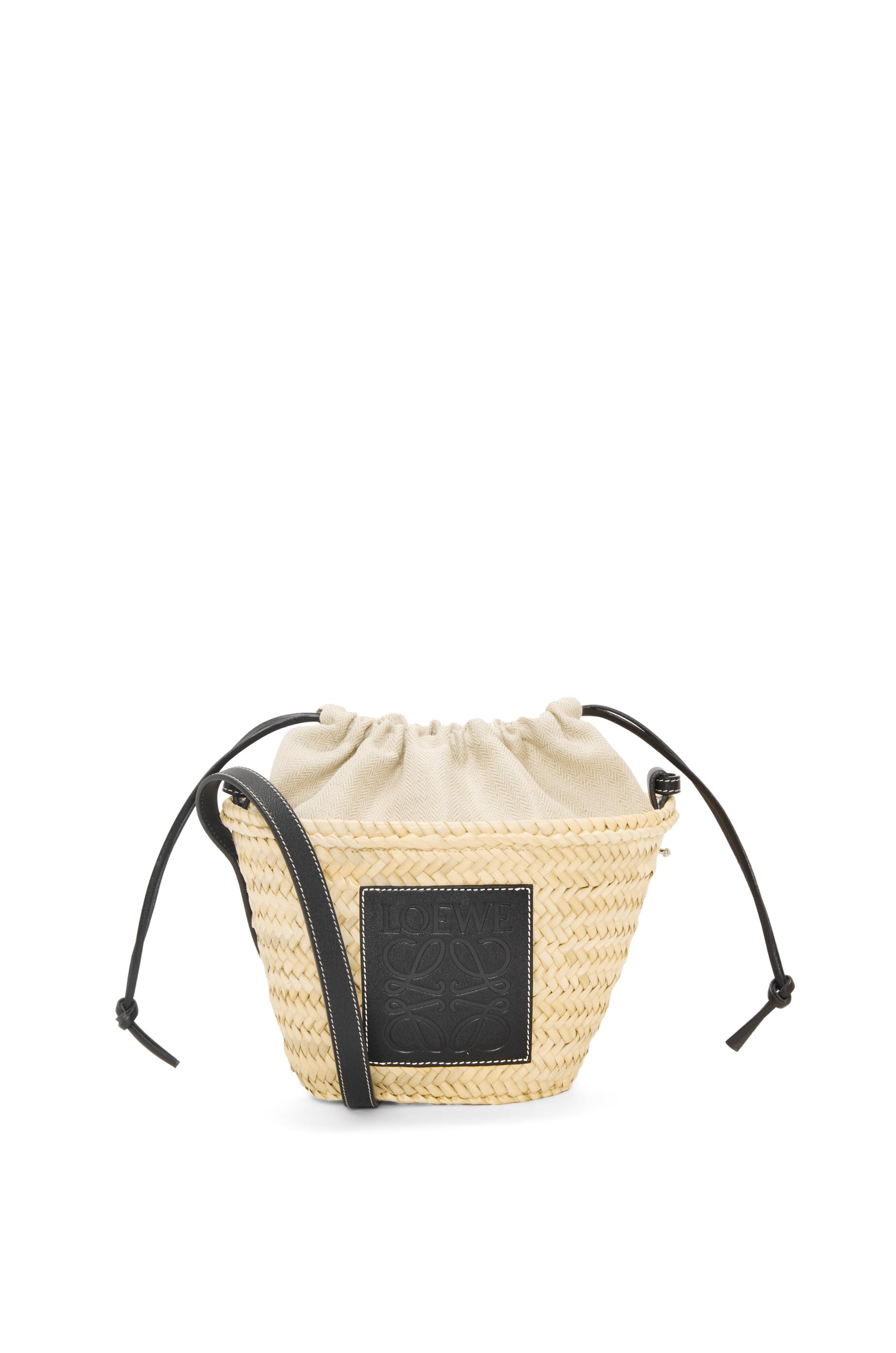 Drawstring bucket bag in palm leaf and calfskin by LOEWE