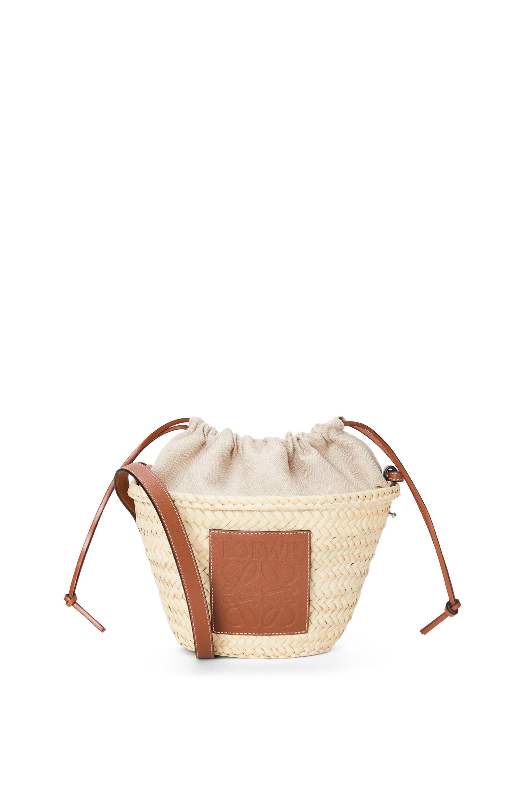 Drawstring bucket in palm leaf and calfskin by LOEWE