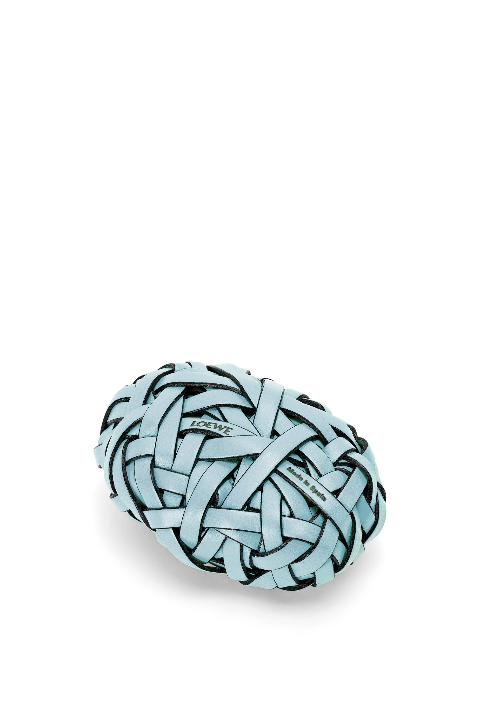 Nest woven paperweight in stone and calfskin by LOEWE