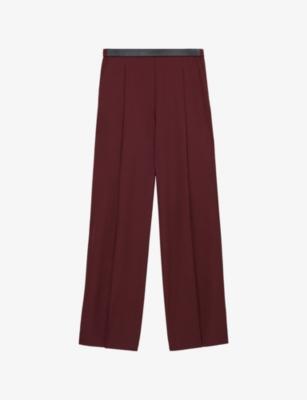 Pleated Leather-Patch Wool Trousers by LOEWE
