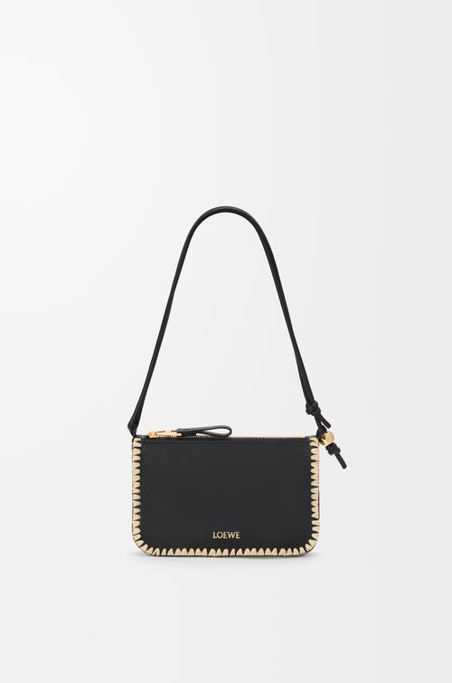 Rio pouch in classic calfskin and raffia by LOEWE