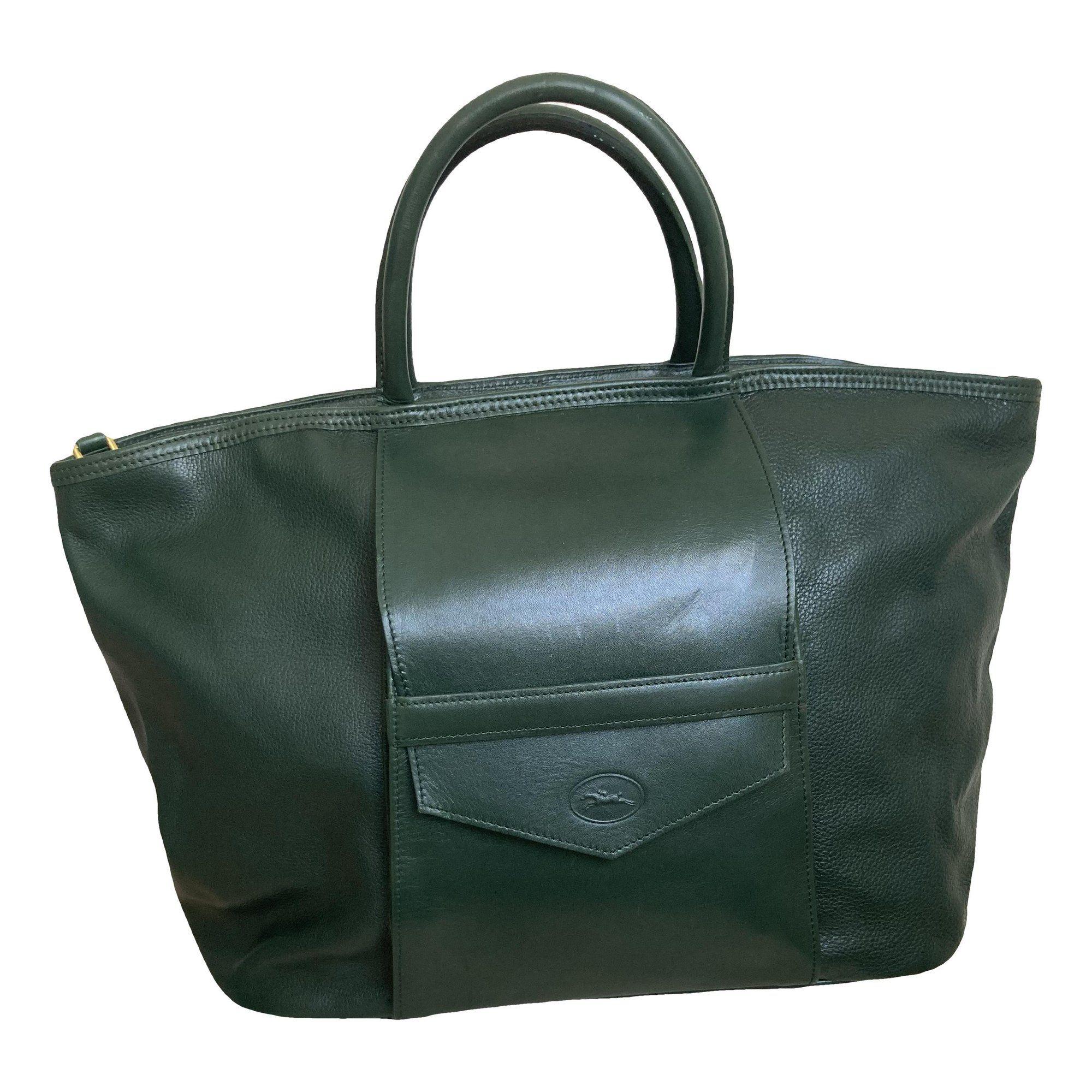 Leather travel bag by LONGCHAMP