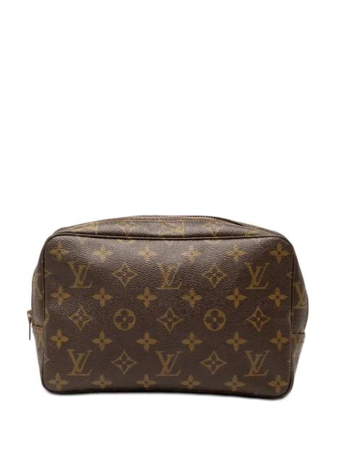 1982 Monogram Trousse Toilette 23 clutch bag by LOUIS VUITTON 