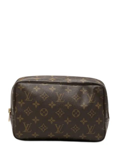 1985 Monogram Trousse Toilette 23 clutch bag by LOUIS VUITTON 