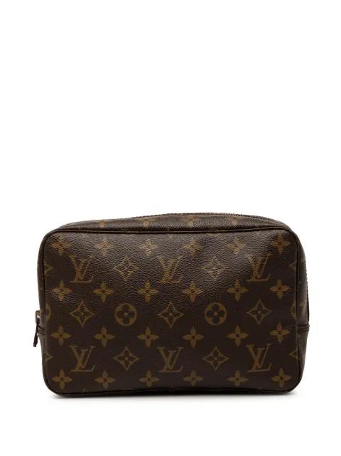 1986 Monogram Trousse Toilette 23 clutch bag by LOUIS VUITTON 