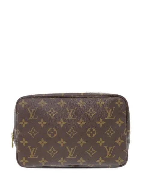 1993 Monogram Trousse Toilette 23 clutch bag by LOUIS VUITTON 