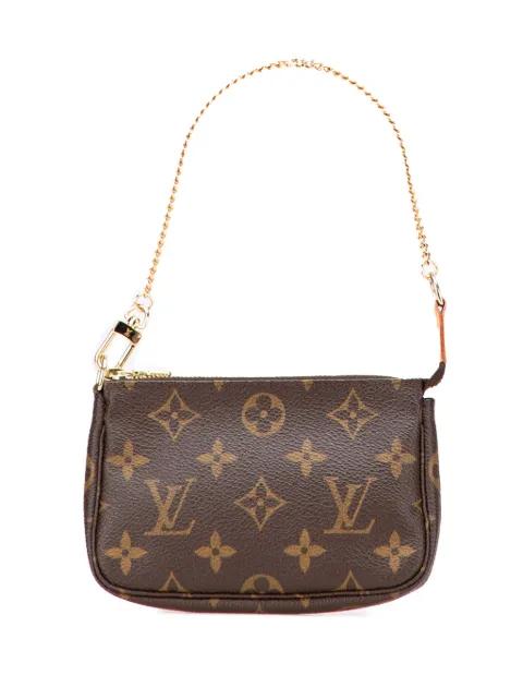 2007 Monogram Mini Pochette Accessoires handbag by LOUIS VUITTON 2007 Monogram Mini Pochette Accessoires handbag by LOUIS VUITTON