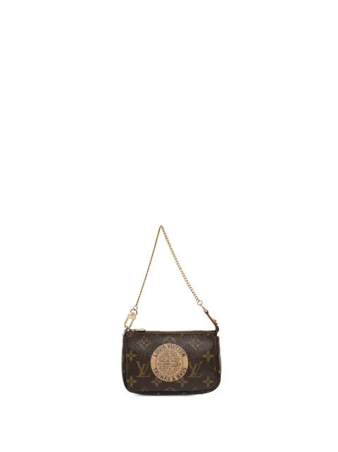 2007 Monogram Trunks and Bags Mini Pochette Accessoires handbag by LOUIS VUITTON 
