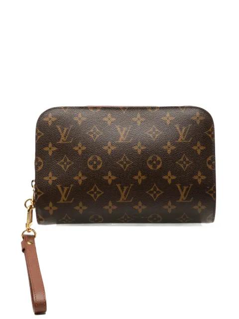 2009 Monogram Orsay clutch bag by LOUIS VUITTON 