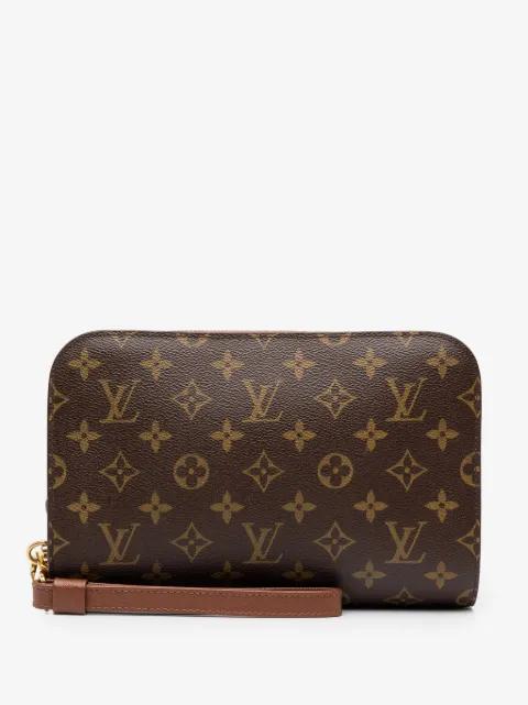 2009 Monogram Orsay clutch bag by LOUIS VUITTON 
