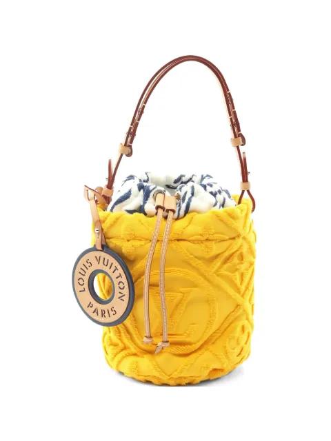 2021s Vacation logo-jacquard bucket bag by LOUIS VUITTON 