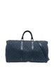 50 Keepall Bandoulière Monogram denim duffel bag by LOUIS VUITTON 50 Keepall Bandoulière Monogram denim duffel bag by LOUIS VUITTON