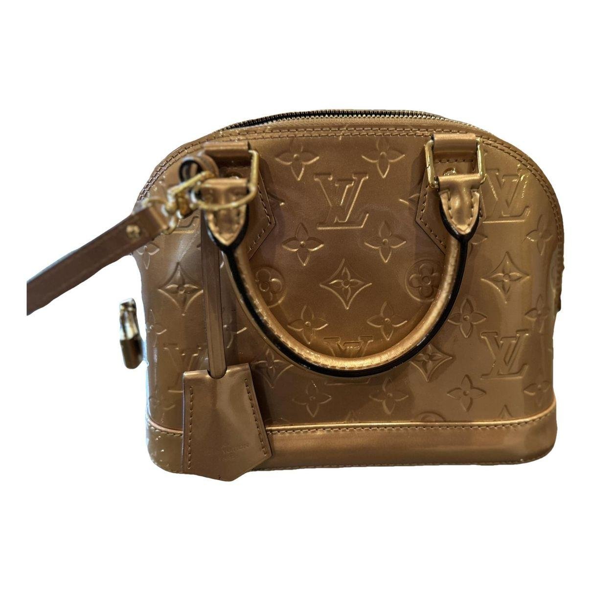 Alma BB patent leather handbag by LOUIS VUITTON