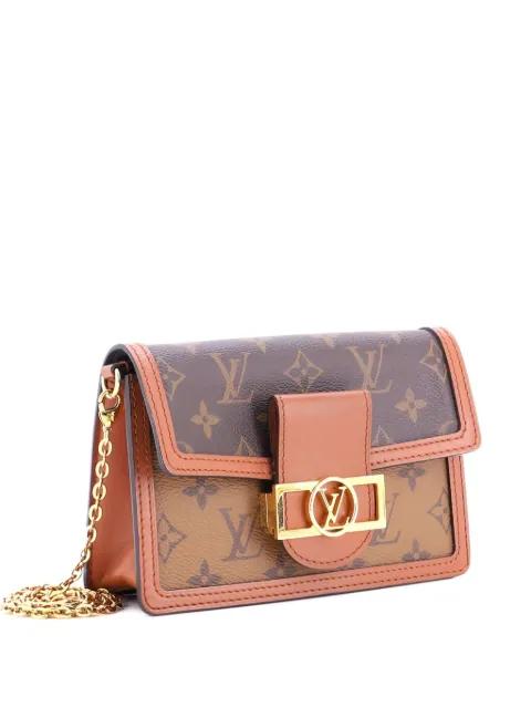 Dauphine Chain Wallet Reverse Monogram Canvas clutch bag by LOUIS VUITTON 