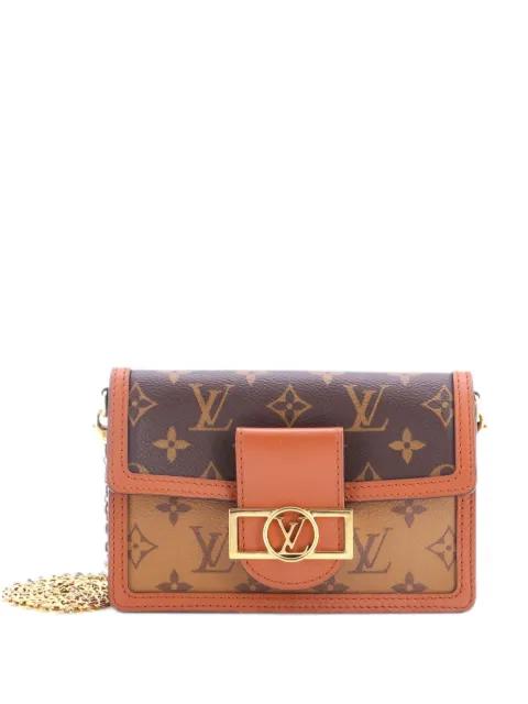 Dauphine Chain Wallet Reverse Monogram Canvas clutch bag by LOUIS VUITTON 