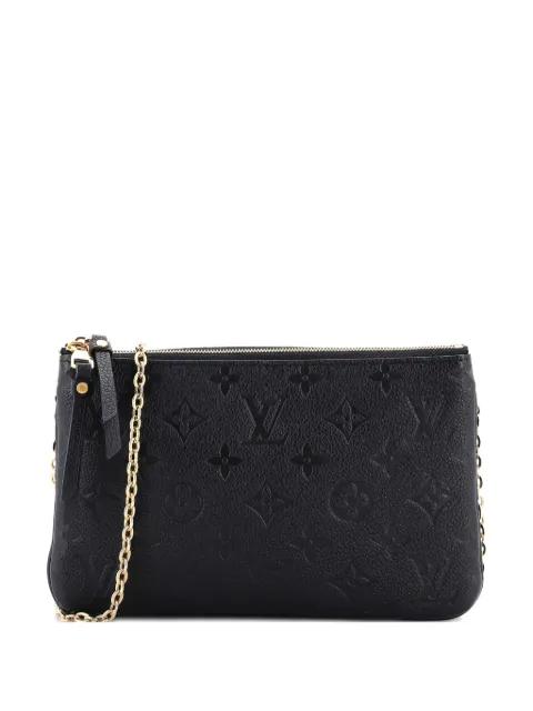 Double Zip Pochette Monogram Empreinte Leather clutch bag by LOUIS VUITTON 