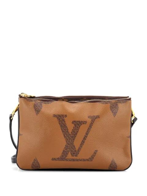 Double Zip Pochette Reverse Monogram Giant clutch bag by LOUIS VUITTON 