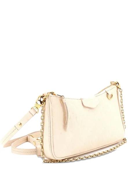 Easy Pouch on Strap Monogram Empreinte Leather shoulder bag by LOUIS VUITTON 