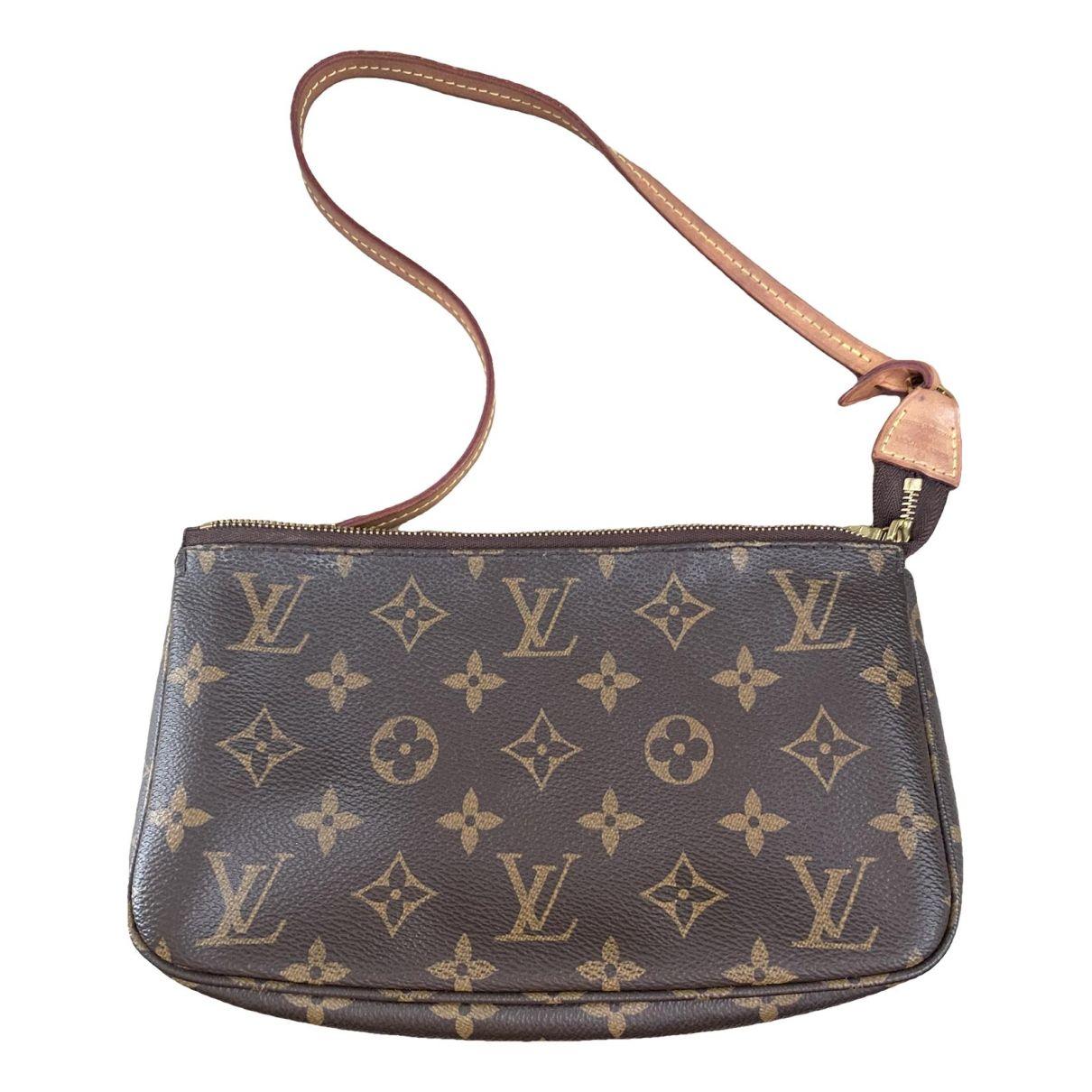 Leather clutch by LOUIS VUITTON