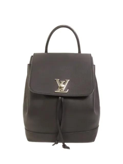Lock Me Evergrain leather backpack by LOUIS VUITTON 