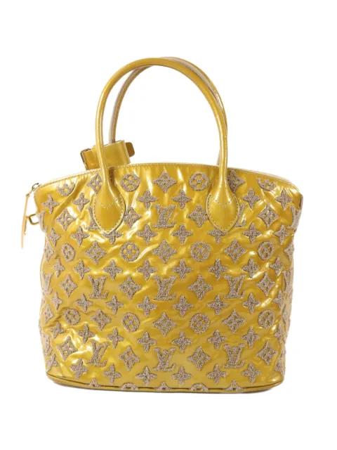 Lockit Fascination-monogram handbag by LOUIS VUITTON 