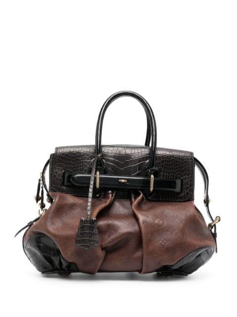 Monogram Debossed box-pleat detail panelled handbag by LOUIS VUITTON 