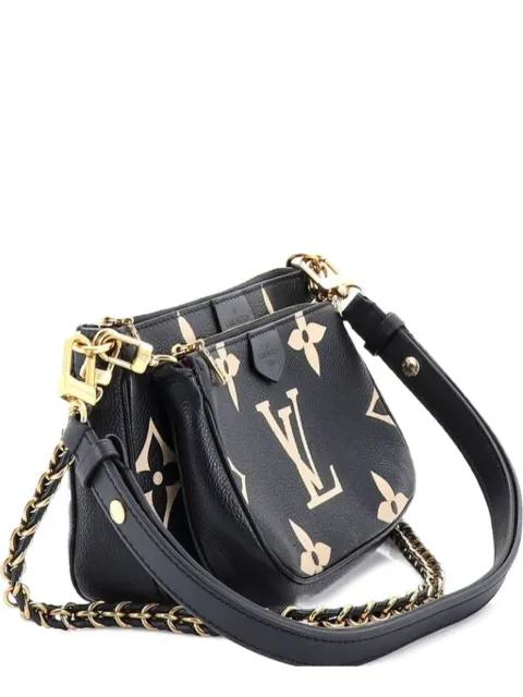 Multi Pochette Accessoires Bicolor Monogram Empreinte Giant crossbody bag by LOUIS VUITTON 